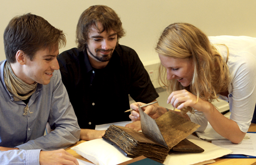 Students with manuscript